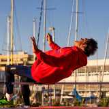Il suo viso teso non nasconde lo sforzo fisico, ma l�atleta riesce con un balzo a superare la sbarra